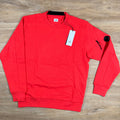 CP Company Diagonal Raised Fleece Lens Sweatshirt in Poinciana Orange